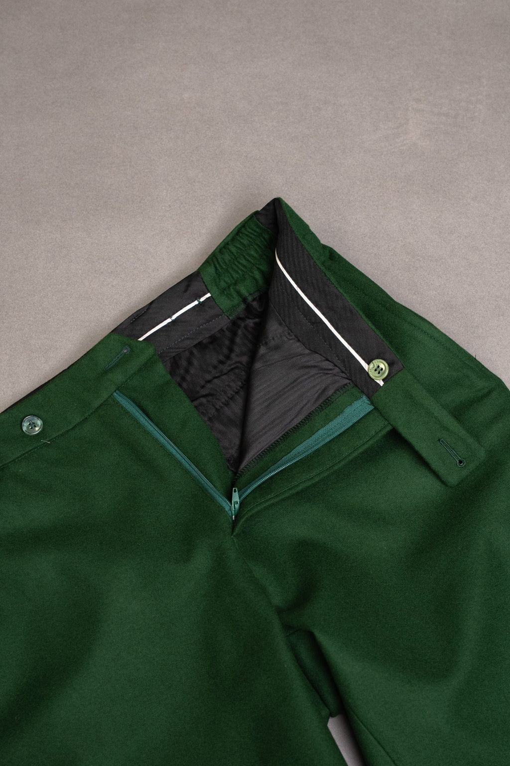 Men's green flannel pants with a relaxed fit, featuring a stylish and comfortable design ideal for casual wear.