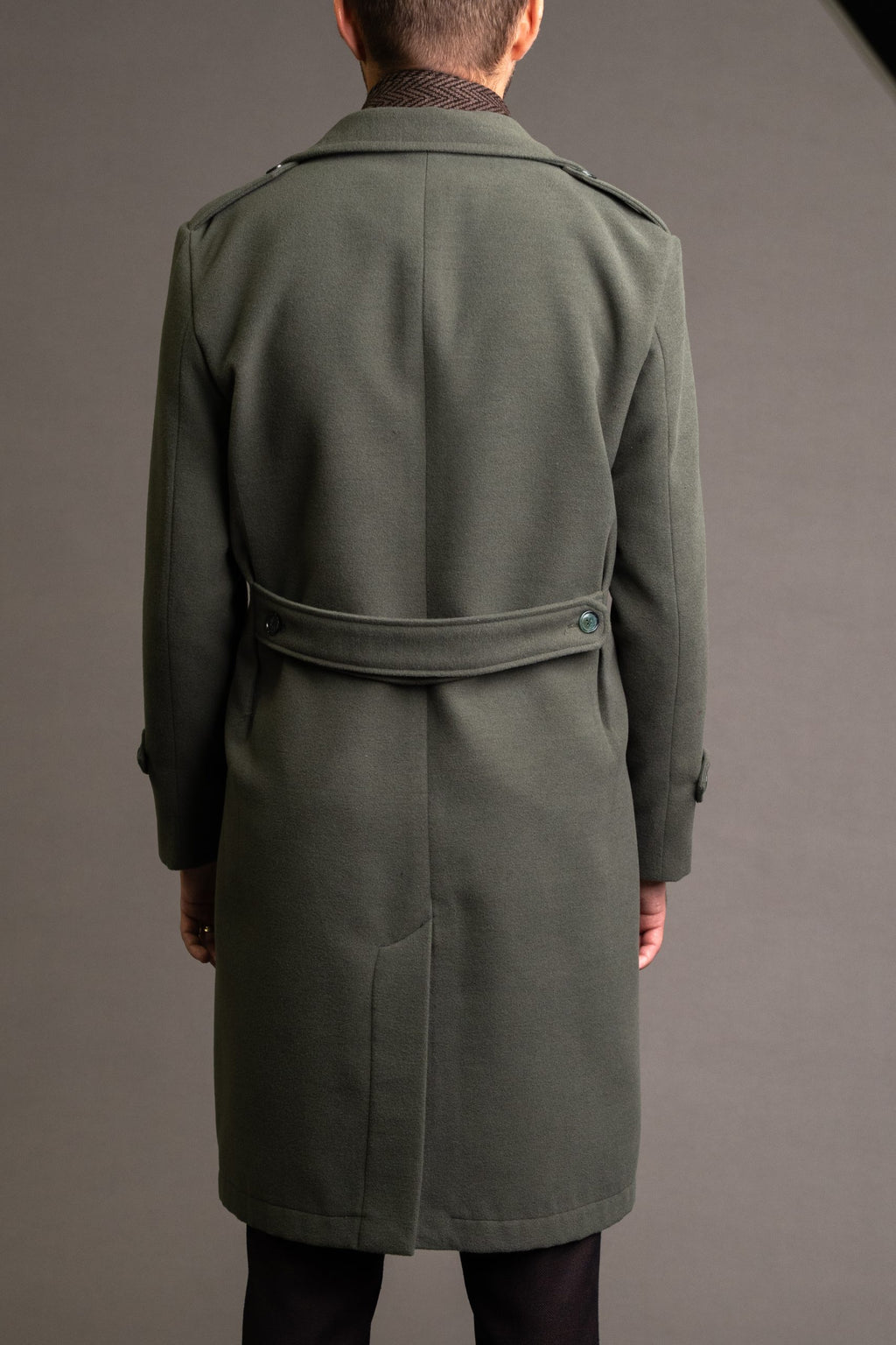 Men's green army-style winter coat by Quiet Luxury, tailored fit with stylish details, ideal for a sophisticated outdoor look.