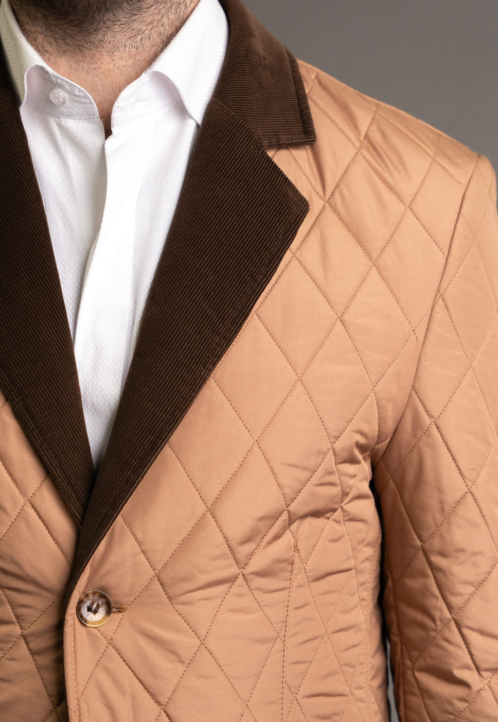 Men's tailored blazer jacket in classic style, made by Couture for Gentlemen, featuring a sleek fit and durable fabric.