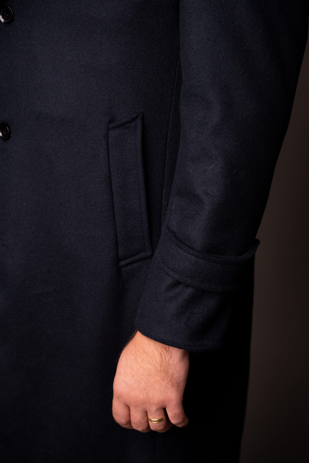 Navy men's coat from Quiet Luxury by Couture for Gentlemen, stylish tailored outerwear with a sleek fit.