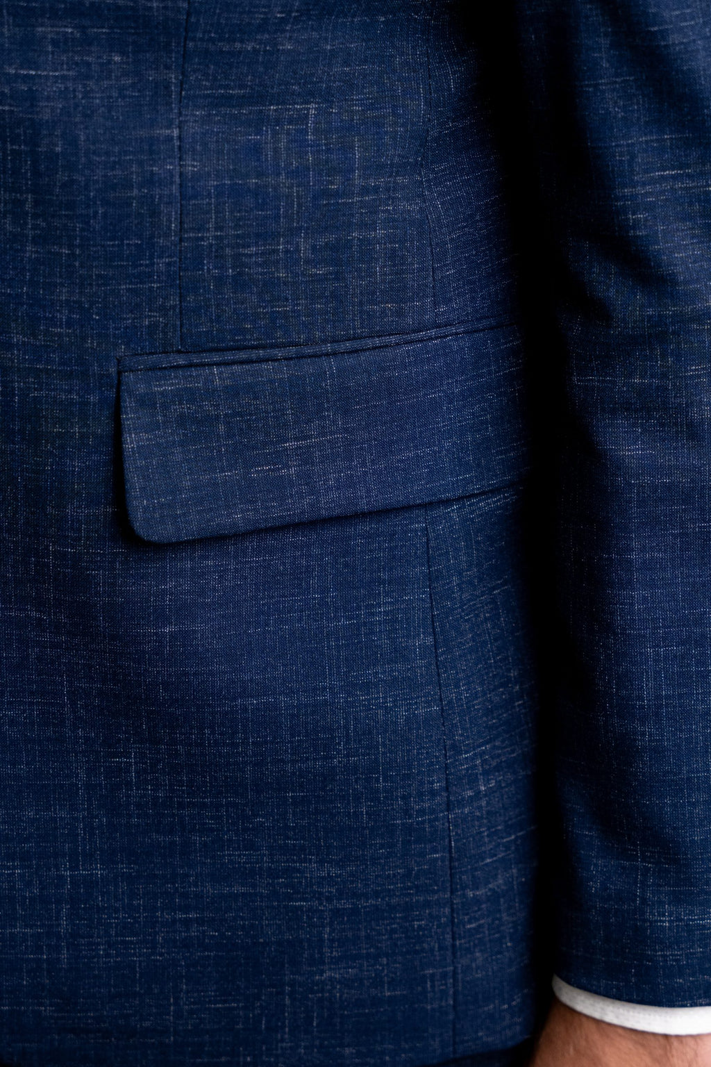 Blue textured blazer from CoutureForGentlemen, stylish men's suit jacket with modern design and tailored fit.