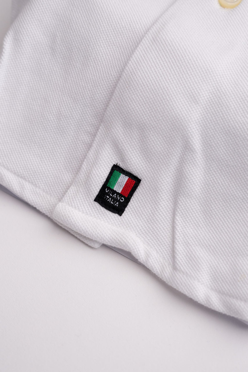 White men's shirt from Sthenford CMS02AS collection, tailored fit, displayed on a hanger against a plain background.