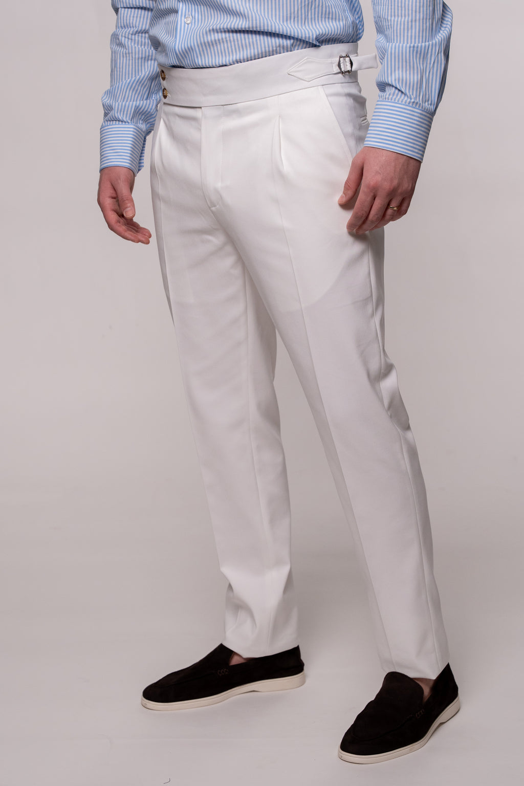 Light blue tailored fit suit jacket from the Solaro collection by Couture for Gentlemen, shown on a hanger.