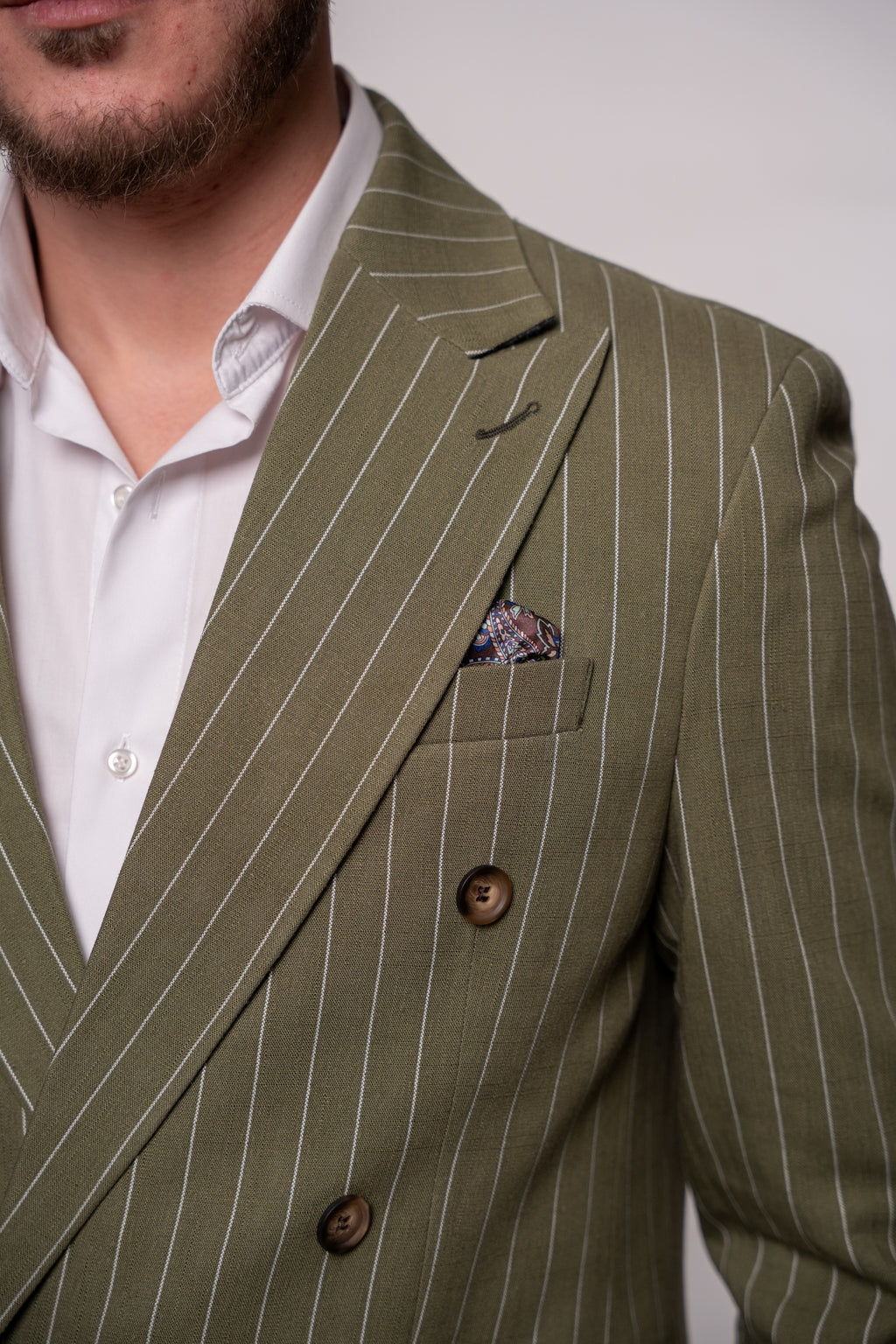 Olive green men's linen blazer with double row buttons and striped pattern, stylish formal jacket by CoutureForGentlemen.