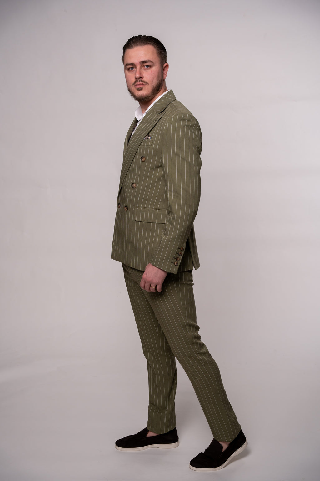 Olive green men's two-button linen blazer with striped pattern, stylish and tailored for a sophisticated look.