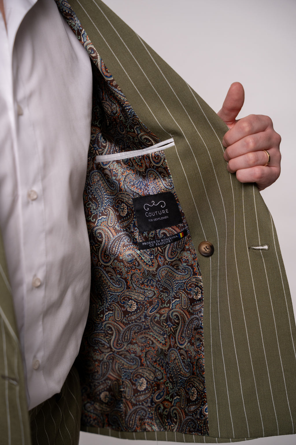 Men's olive green linen blazer with two rows of buttons, featuring striped design and tailored fit by CoutureForGentlemen.