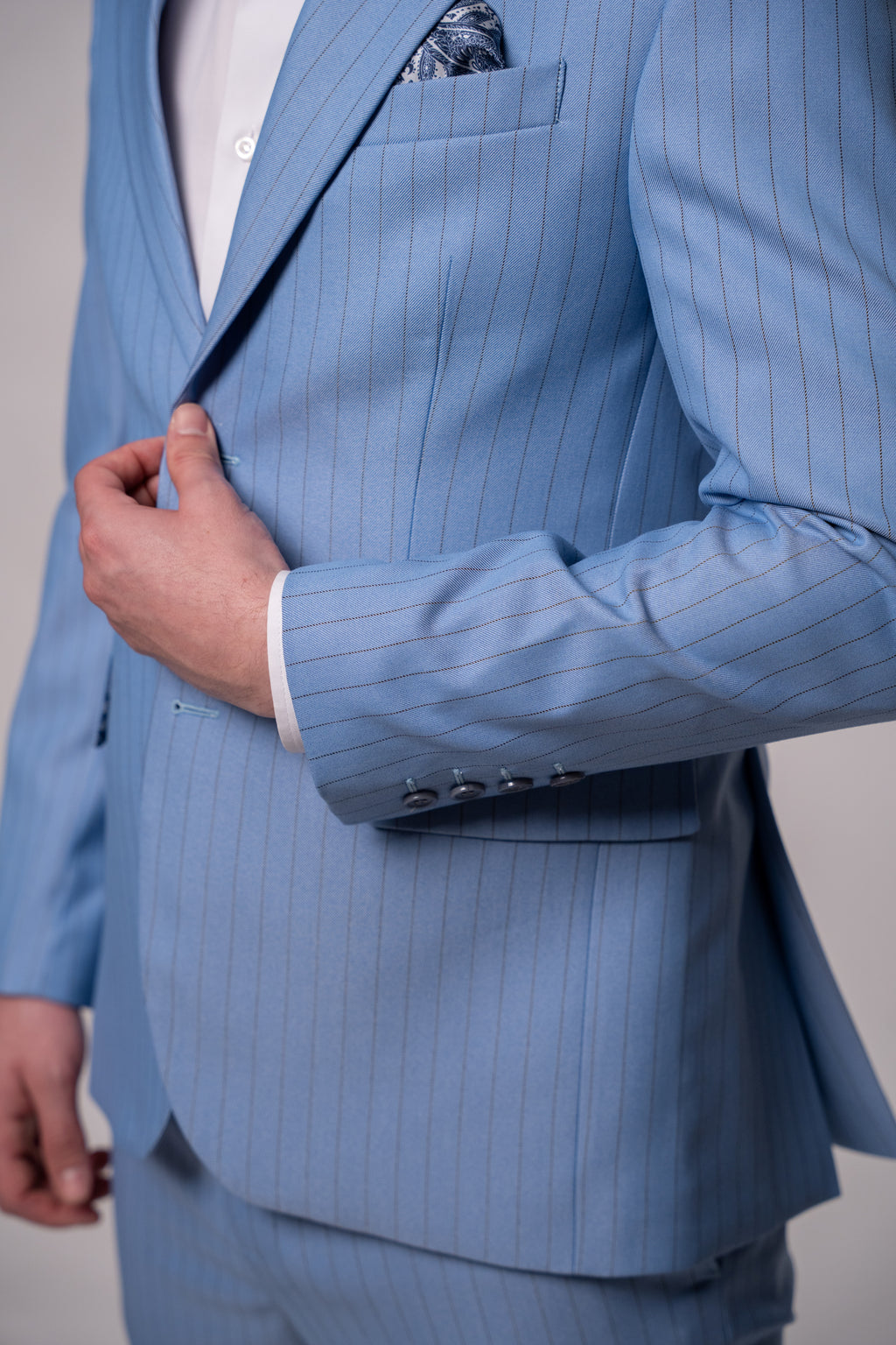 Light blue men's striped costume jacket from CoutureforGentlemen, tailored fit with classic design and button details.