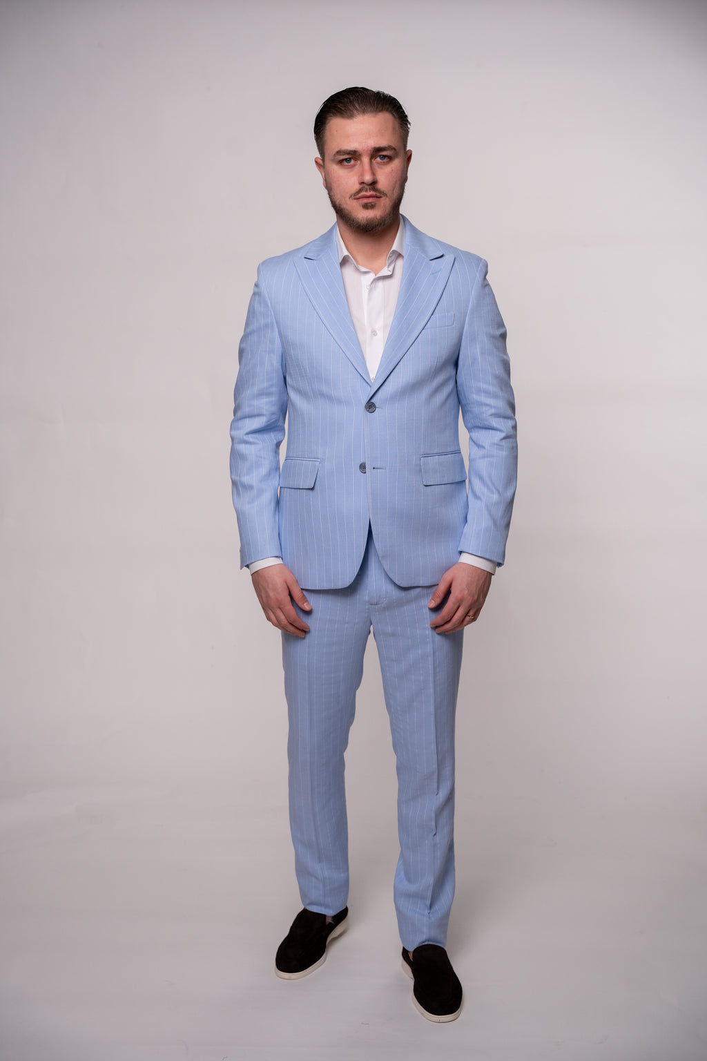 Baby blue striped men's suit jacket from CoutureforGentlemen, featuring tailored fit and stylish design.