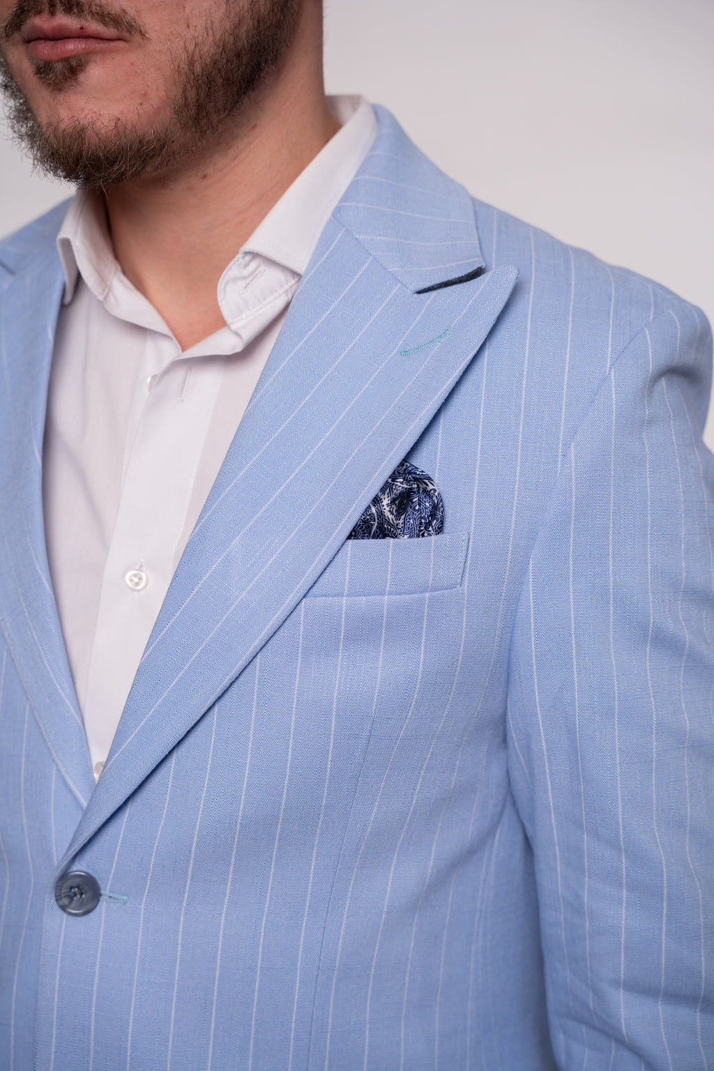 Baby blue striped men's linen suit by CoutureforGentlemen, featuring tailored fit and elegant design.