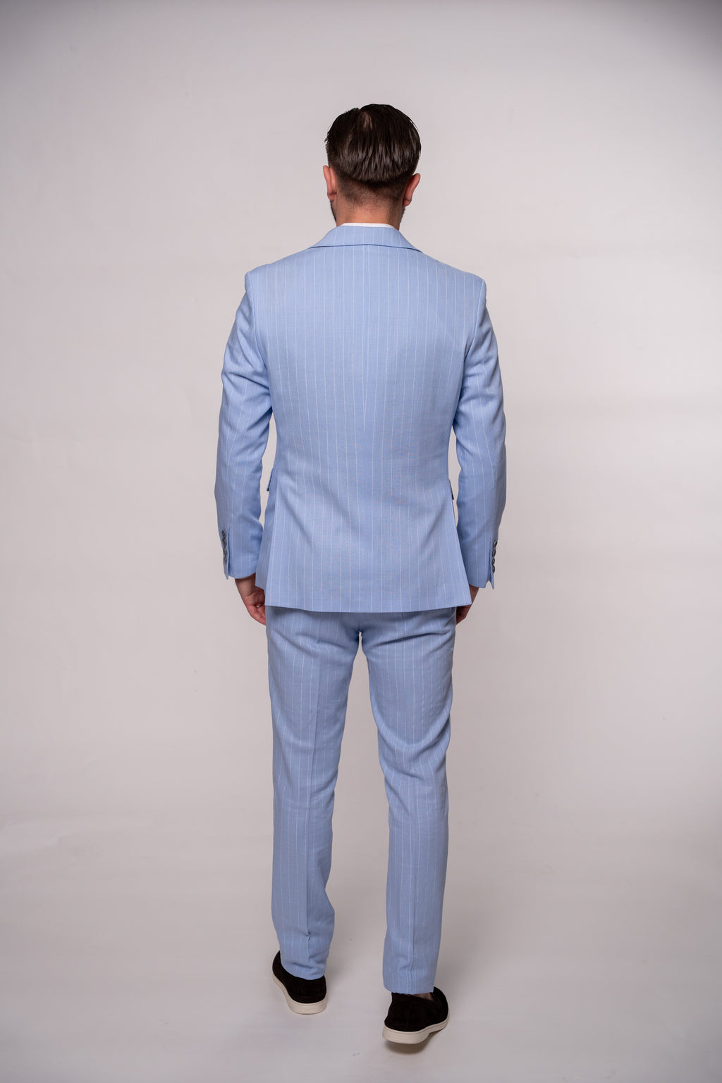 Baby blue striped men's linen suit by Couture for Gentlemen, featuring tailored fit and classic style.