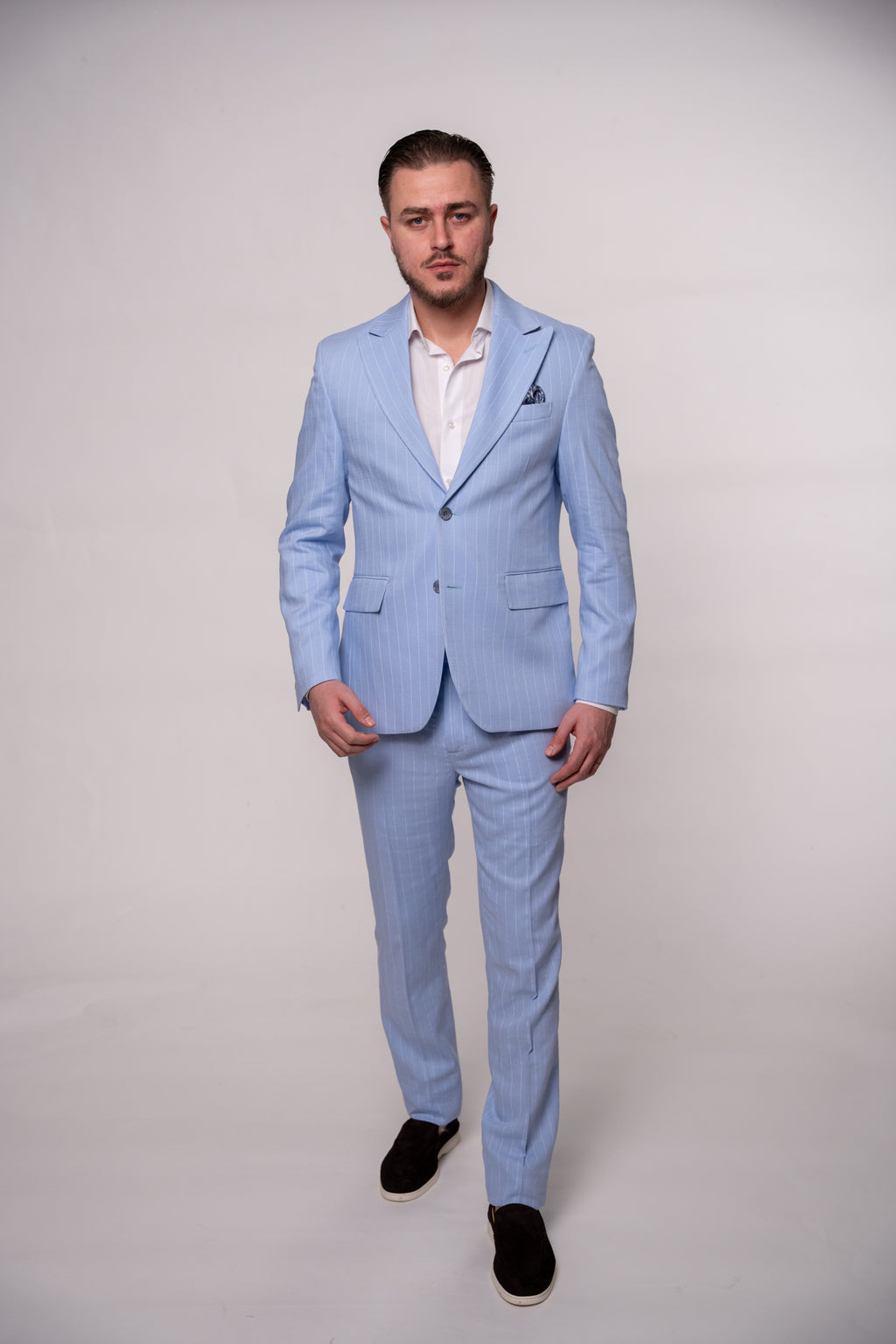 Baby blue striped men's linen suit by CoutureforGentlemen, featuring tailored fit and stylish design.