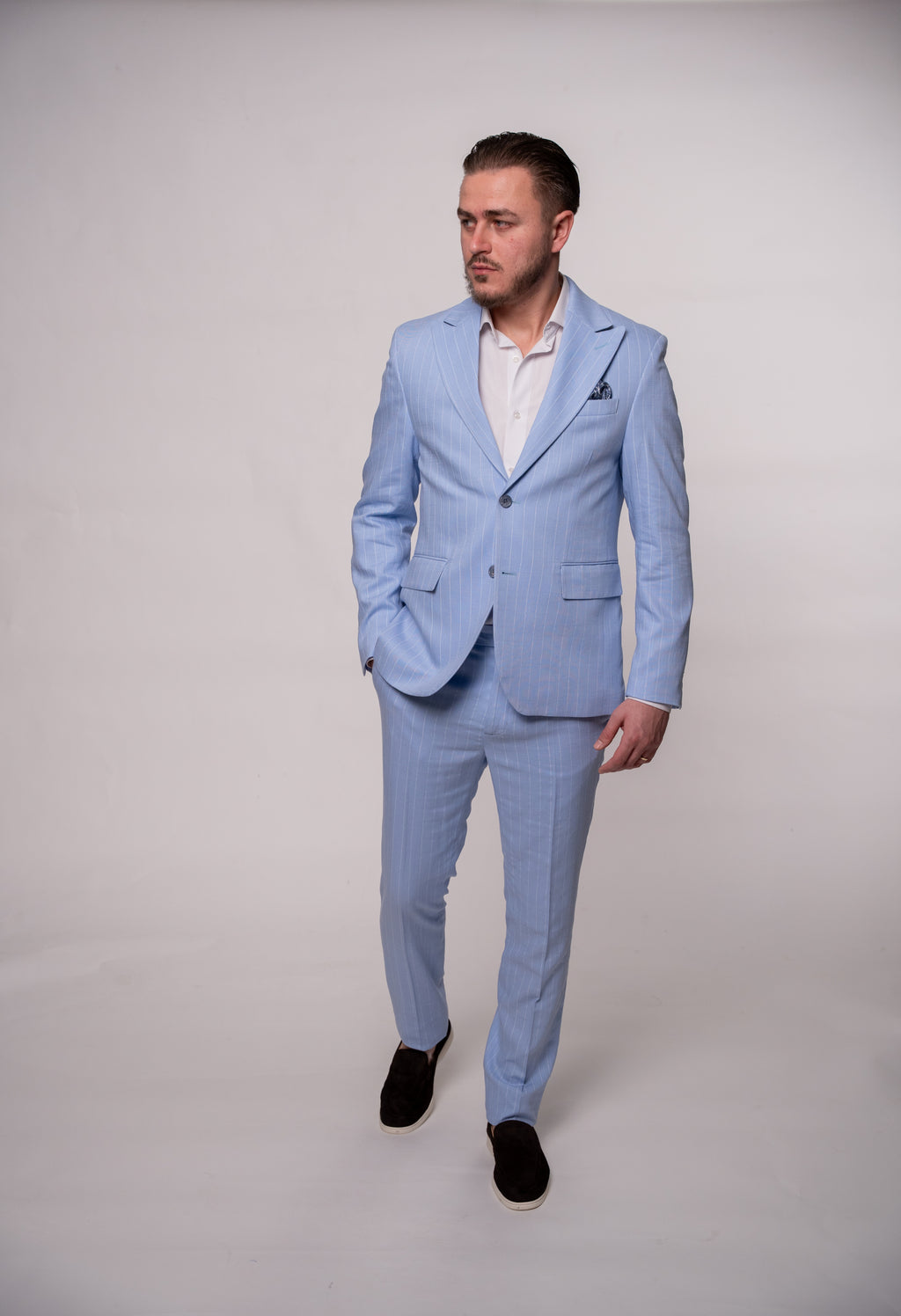 Light blue striped men's costume blazer from CoutureforGentlemen, featuring a tailored fit and classic design.