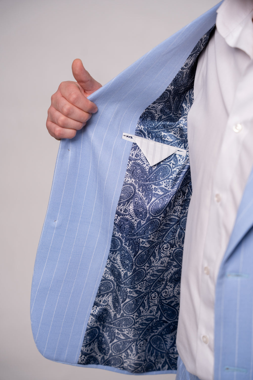 Baby blue striped men's costume jacket from CoutureforGentlemen, featuring tailored fit and stylish design.