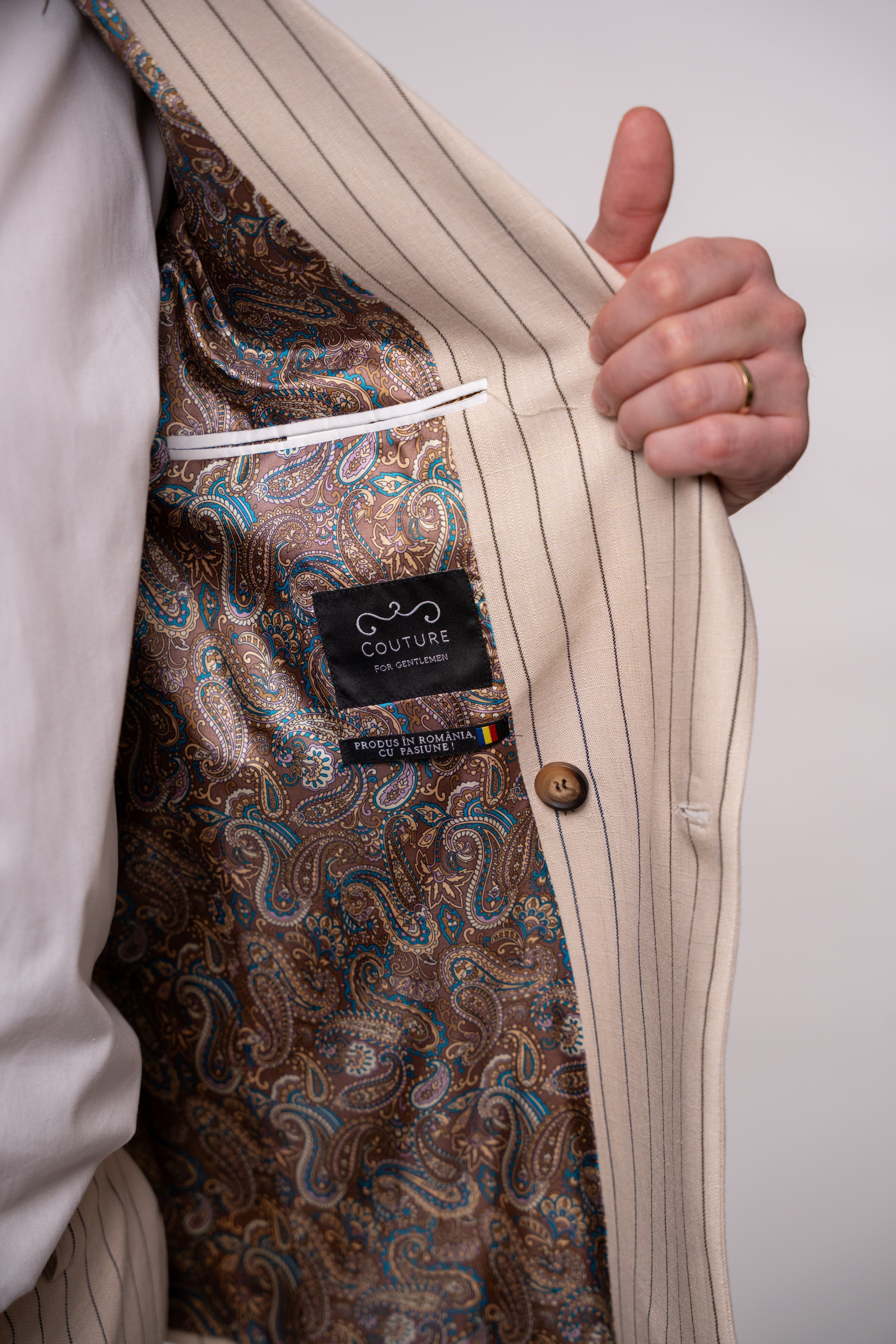 Beige men's linen blazer with two rows of buttons from CoutureforGentlemen, featuring a classic striped pattern and tailored fit.