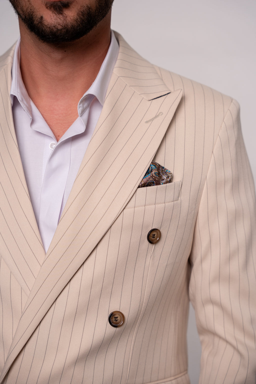 Beige men's blazer with double row of buttons and striped design, stylish formal jacket by CoutureforGentlemen.