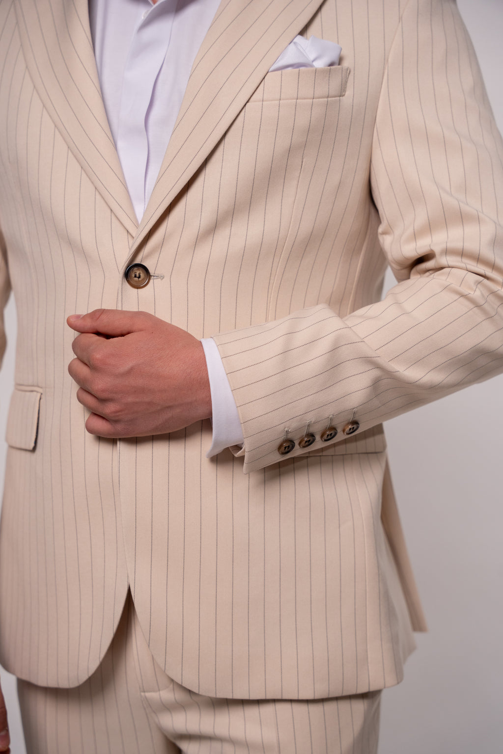 Beige men's striped blazer from CoutureForGentlemen, tailored fit with classic lapel and stylish pattern, front view.