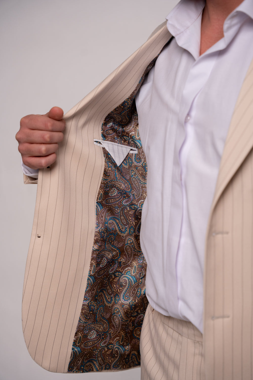 Beige men's striped costume jacket from CoutureforGentlemen, tailored fit, stylish formal wear for men.