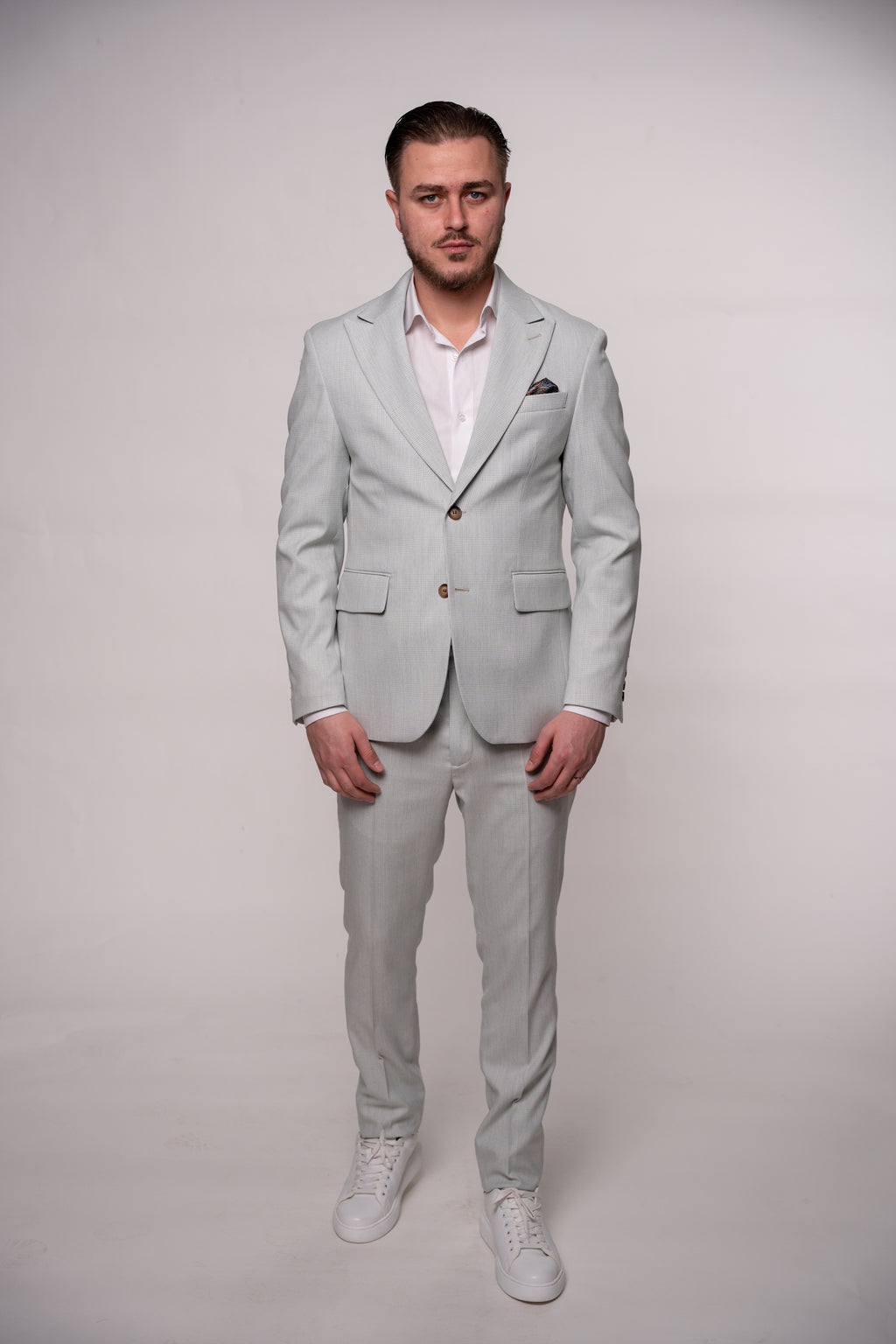 Light green plaid men's costume jacket featuring classic checkered pattern, stylish and tailored for a sophisticated look.