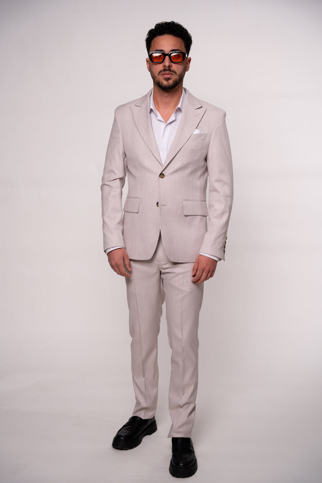Light pink checkered men's costume blazer with a tailored fit, designed by Couture for Gentlemen.