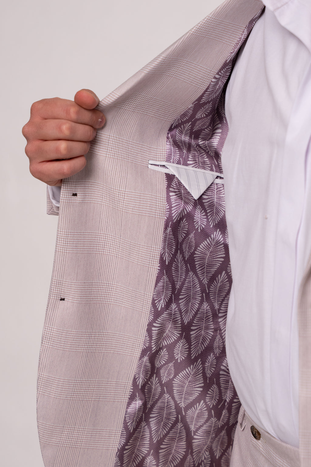 Light pink checkered men's costume blazer by Couture for Gentlemen, featuring a tailored fit and stylish pattern.