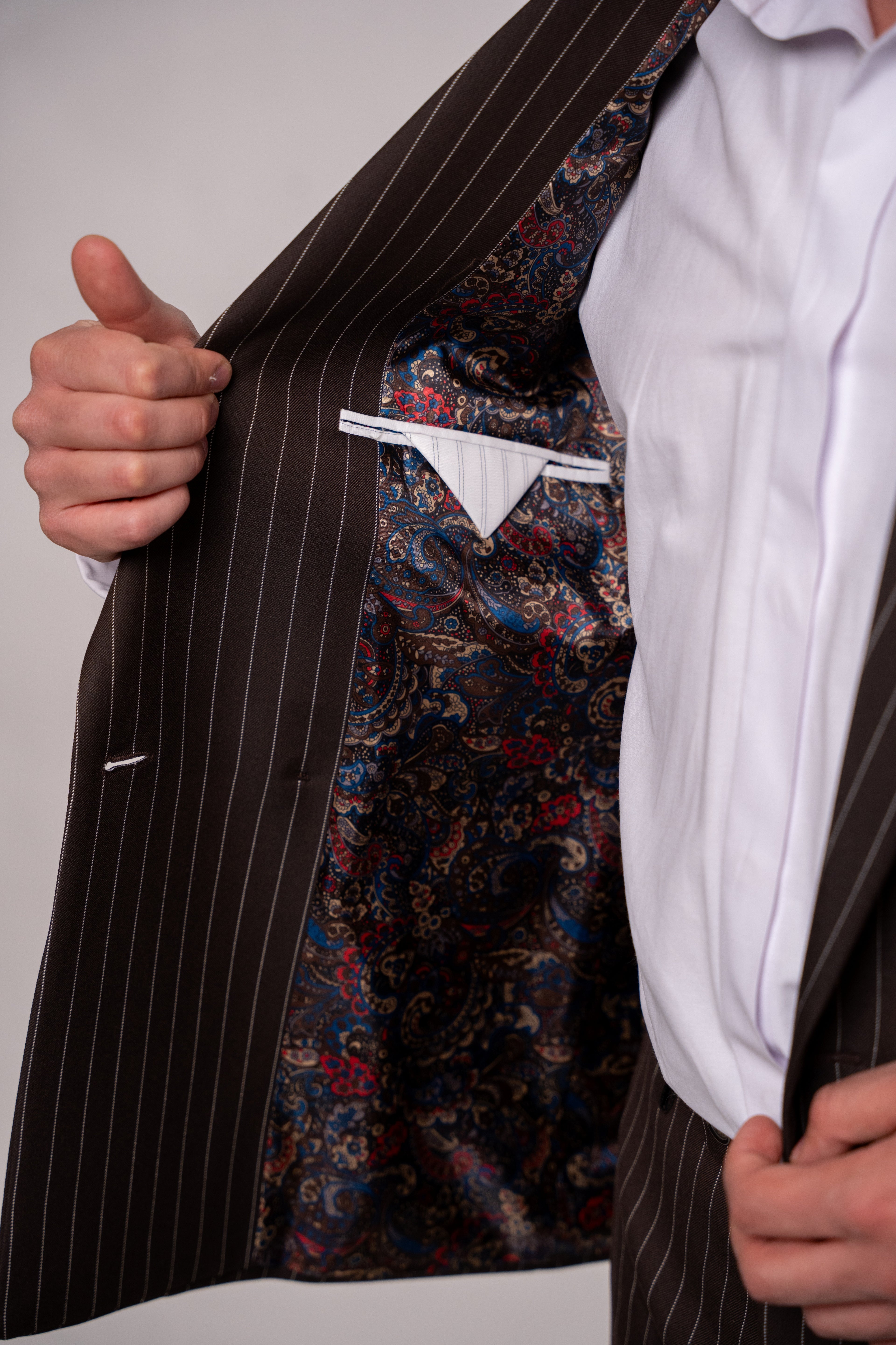 Maroon striped two-row button costume jacket from CoutureforGentlemen, detailed fabric and tailored fit.
