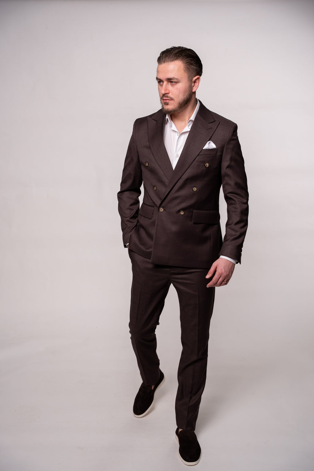 Chocolate brown Napoli-style men's coat buttons with two rows, shown on a garment for CoutureForGentlemen.