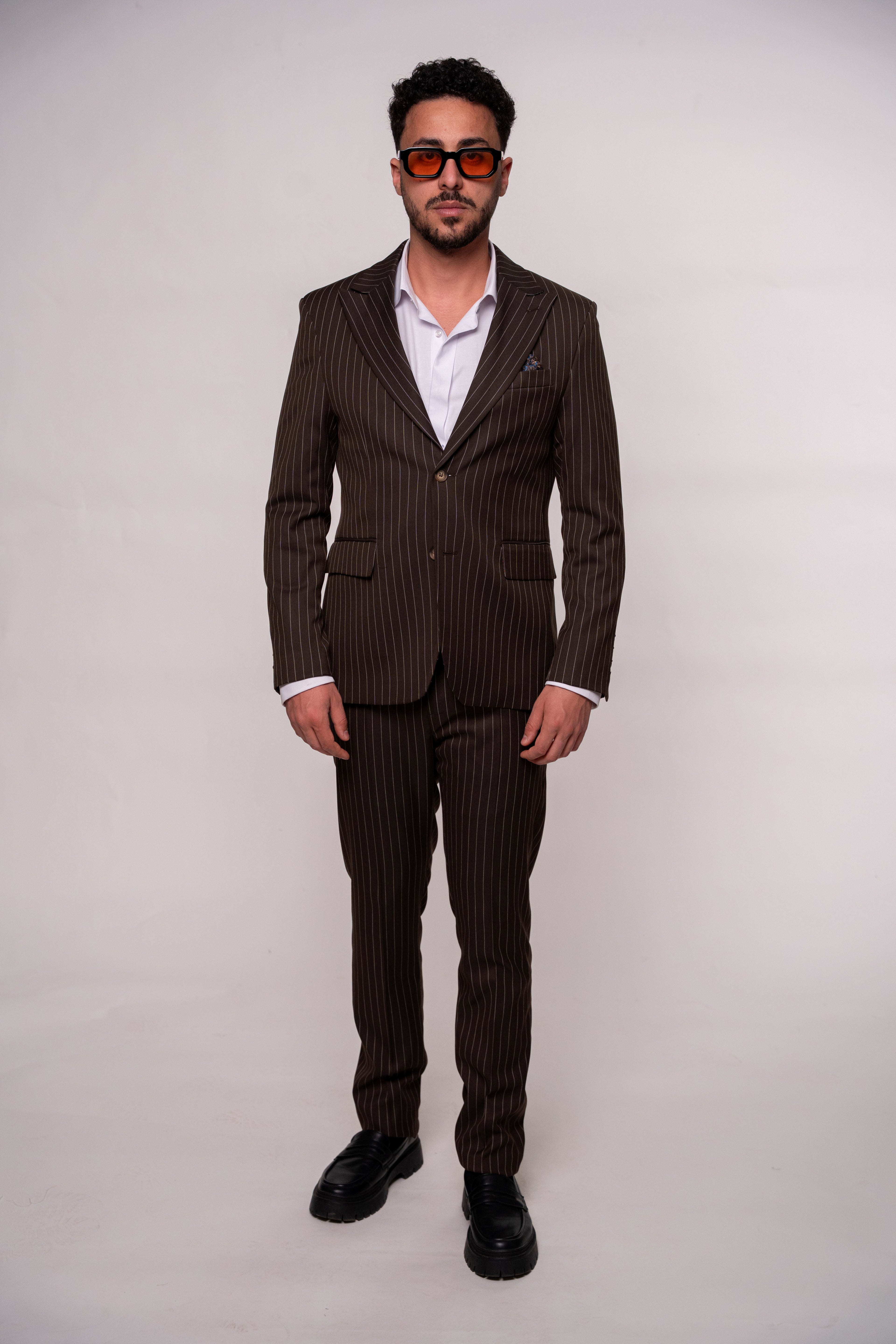 Men's brown striped costume blazer from Couture for Gentlemen, featuring a tailored fit and classic pattern.