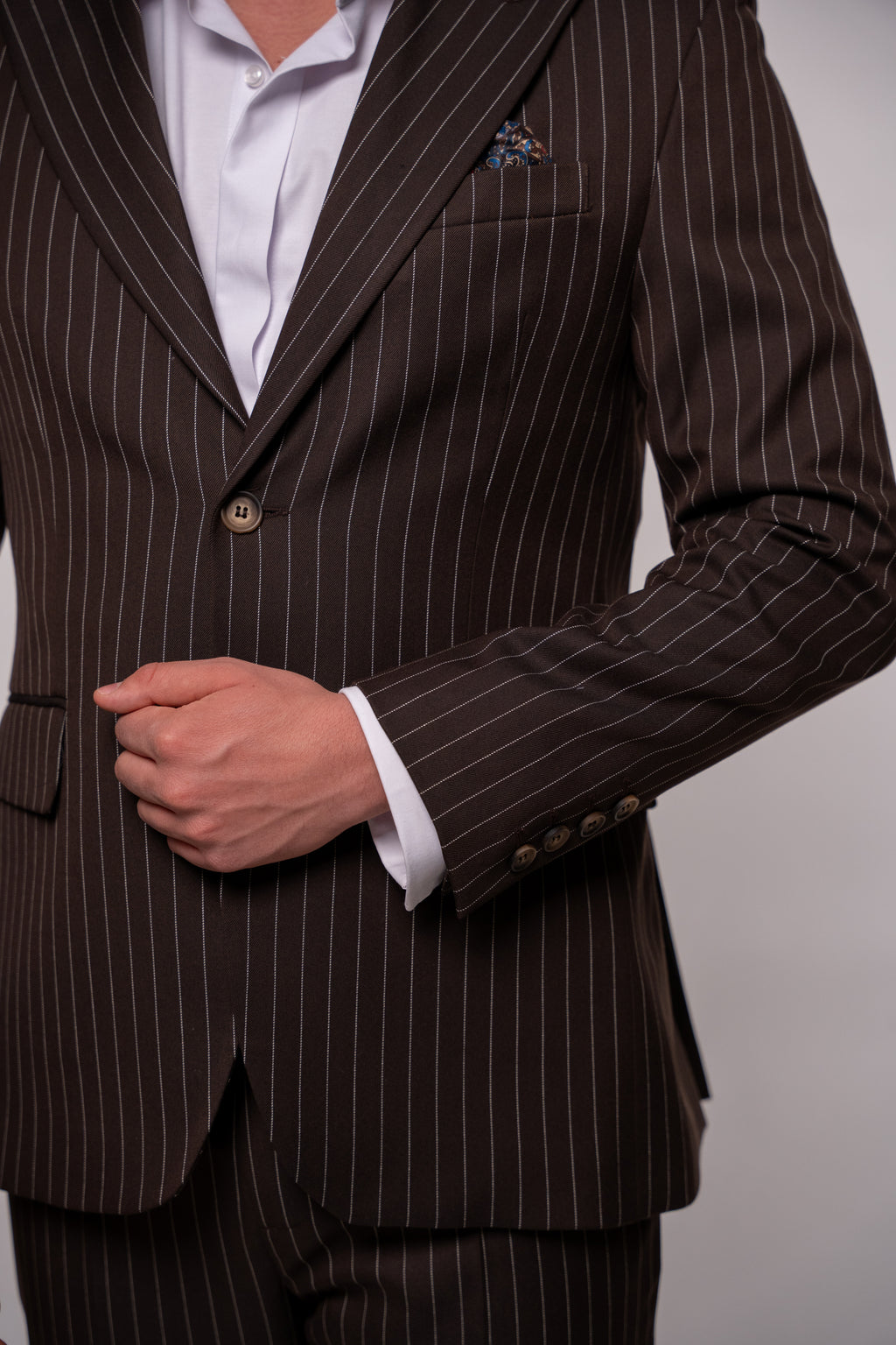 Men's brown striped costume blazer from Couture for Gentlemen, tailored fit, with notch lapel and stylish pattern details.
