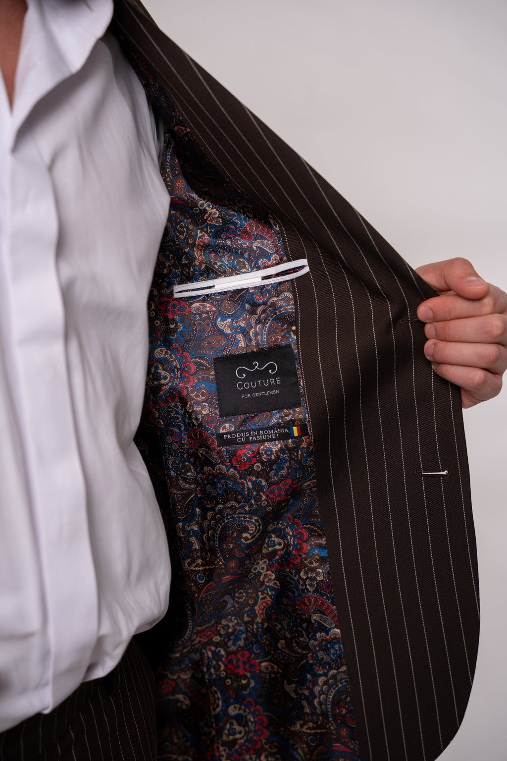 Men's brown striped costume jacket from CoutureforGentlemen, tailored fit with classic pattern and detailed stitching.