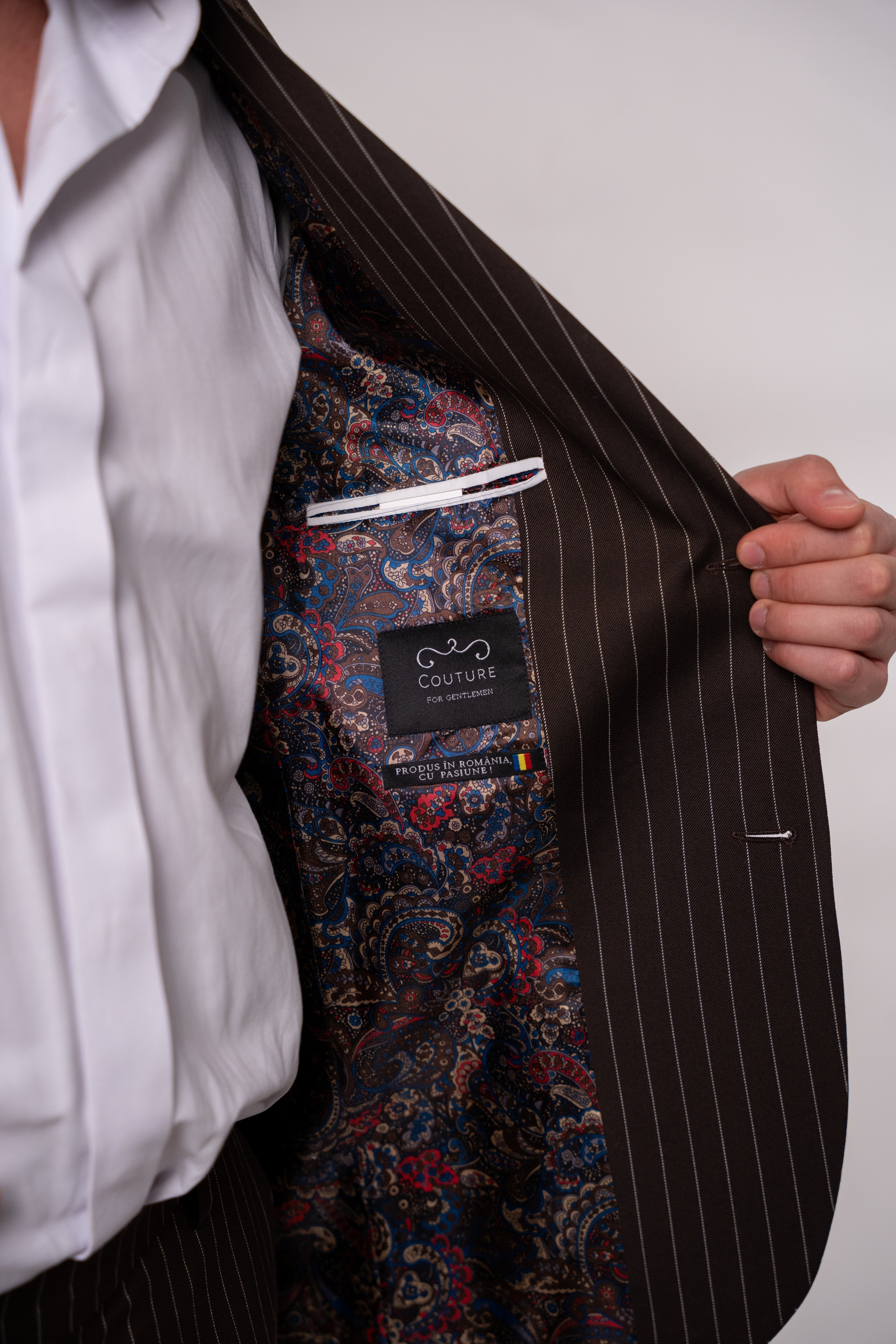 Men's brown striped costume jacket from CoutureforGentlemen, tailored fit with classic pattern and detailed stitching.