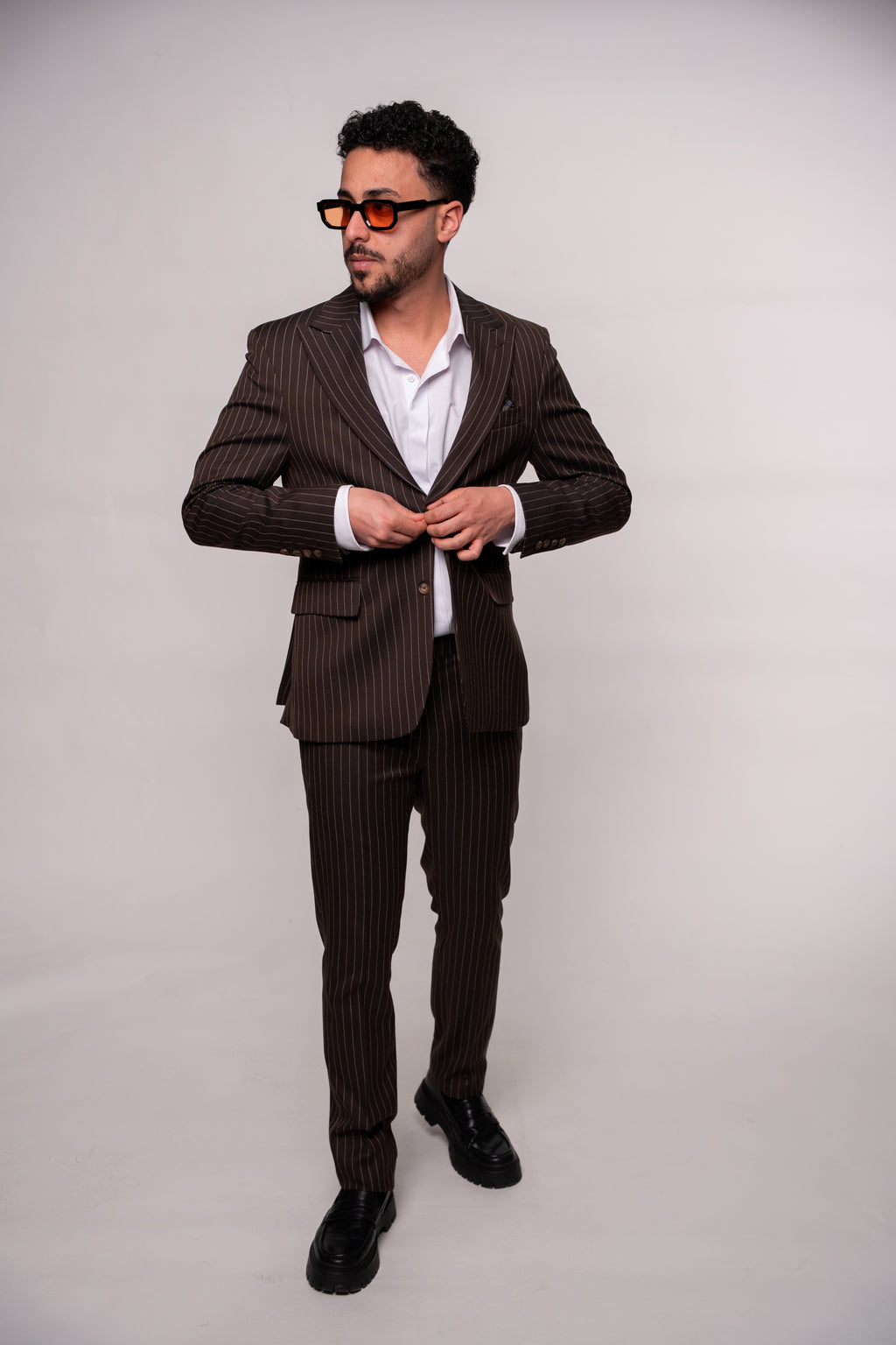 Men's brown striped costume jacket from CoutureforGentlemen, tailored fit with classic lapels and stylish pattern.