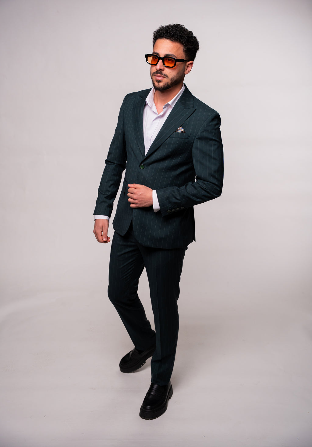 Men's green striped costume jacket from CoutureforGentlemen, featuring a tailored fit and classic style.