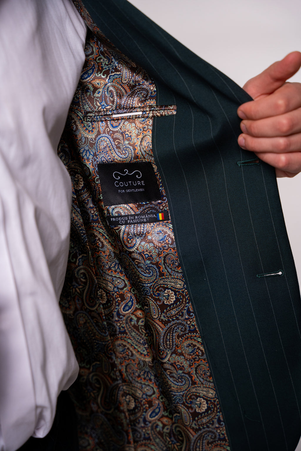 Men's green striped suit jacket by CoutureforGentlemen, tailored fit with notch lapel and stylish pattern.