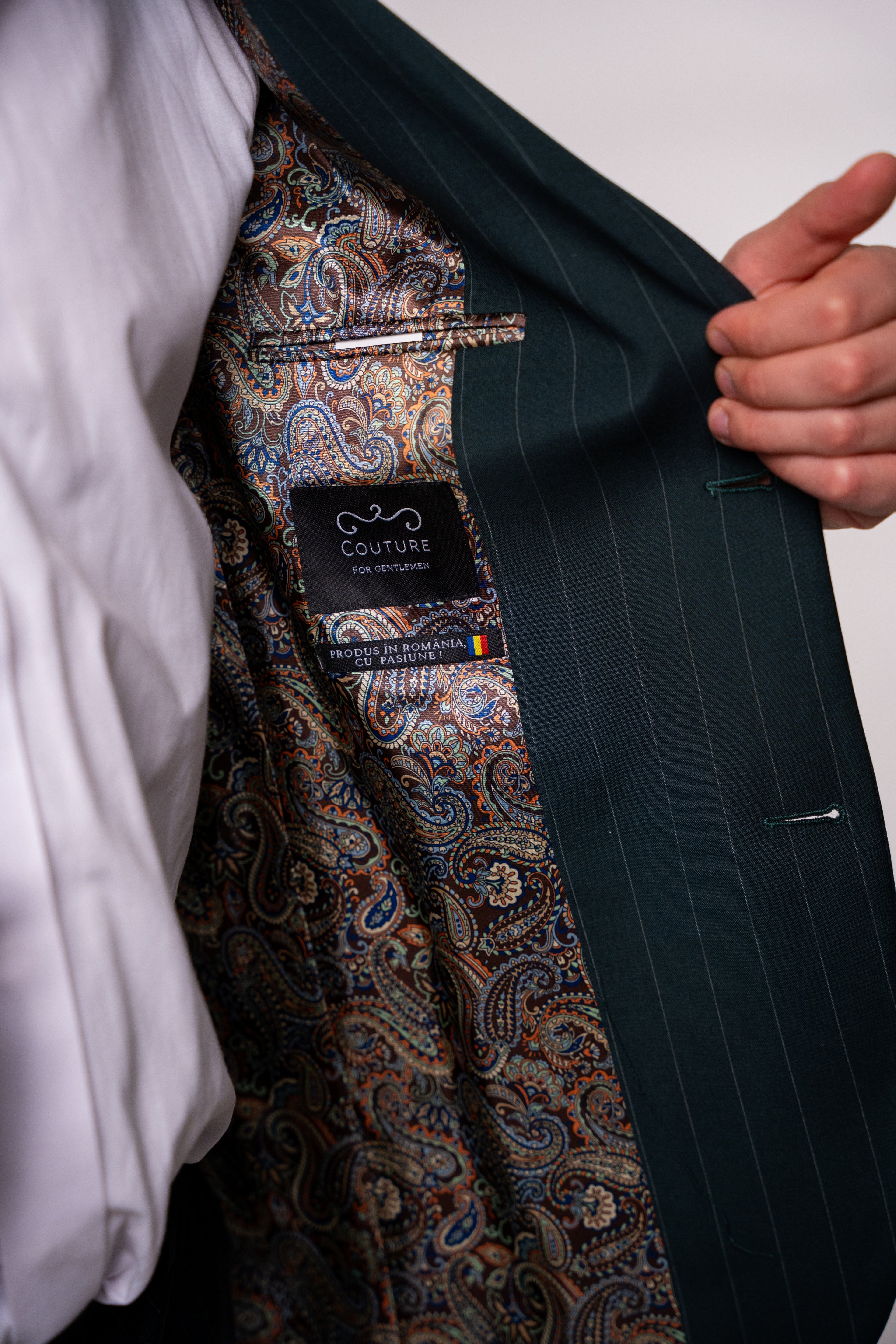 Men's green striped suit jacket by CoutureforGentlemen, tailored fit with notch lapel and stylish pattern.