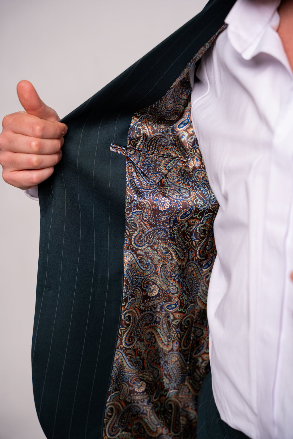 Men's green striped costume suit, stylish tailored blazer and trousers for formal occasions, from Couture for Gentlemen.