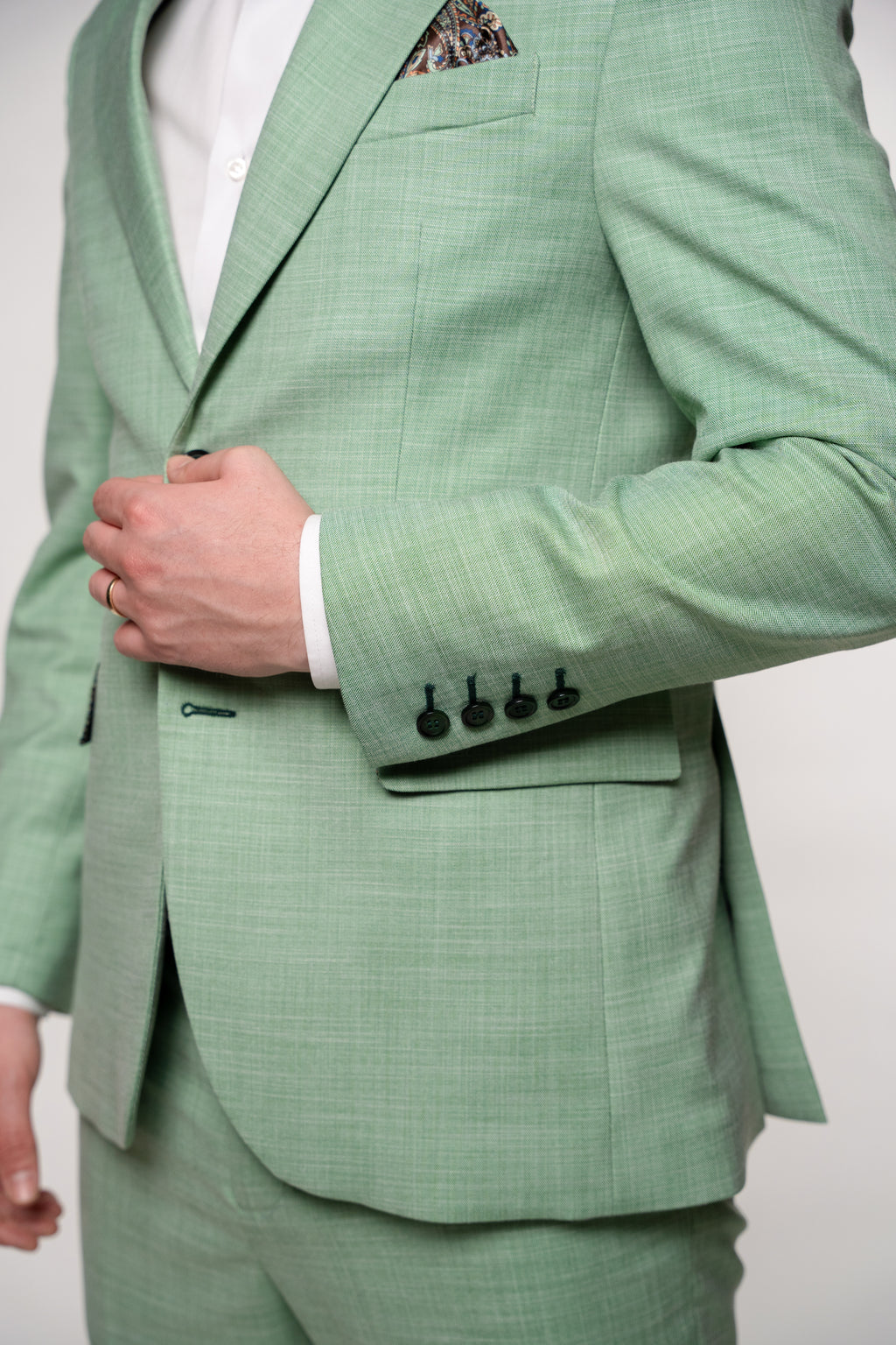 Green Amalfi costume for men by Couture for Gentlemen, featuring tailored fit and stylish details in a professional setting.