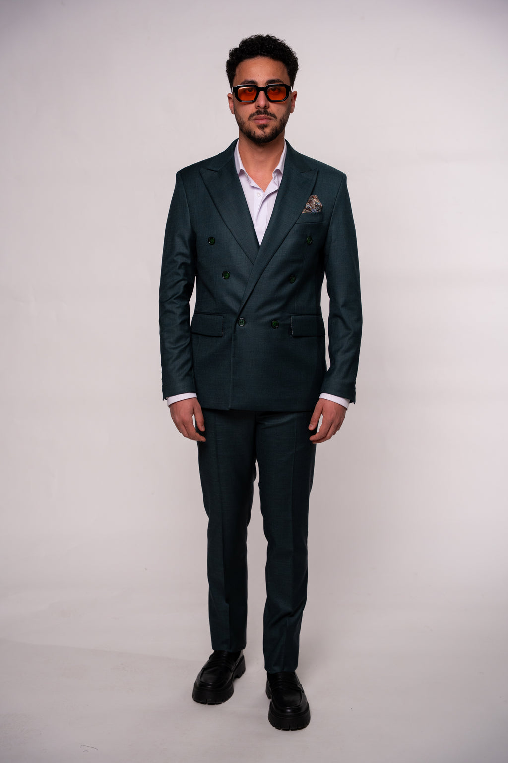 Dark green men's blazer with two rows of buttons, tailored fit, crafted by CoutureforGentlemen.