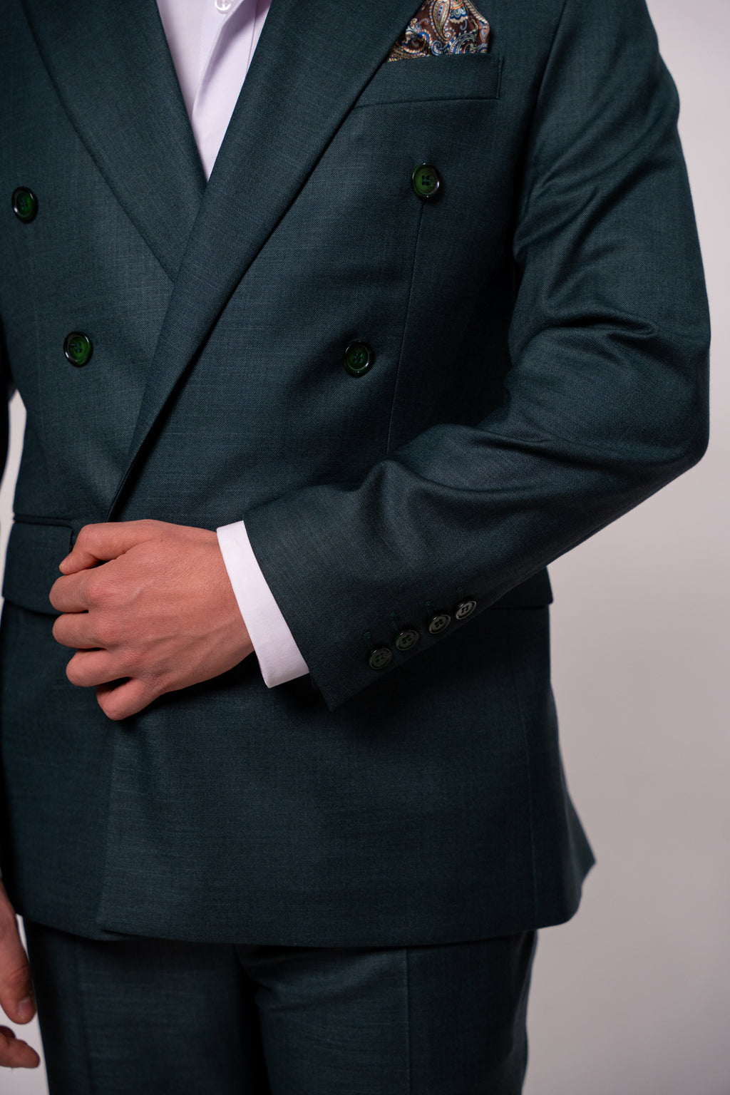 Dark green men's blazer with two rows of buttons, featuring a tailored fit and classic style, from coutureforgentlemen.ro.