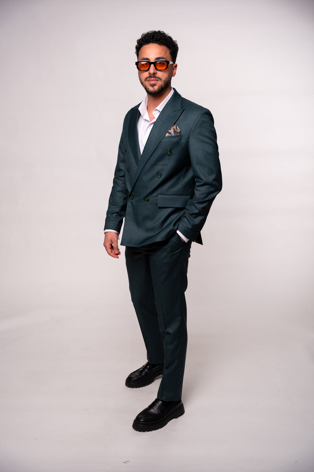 Dark green men's blazer with two rows of buttons, stylish formal jacket by Couture for Gentlemen.