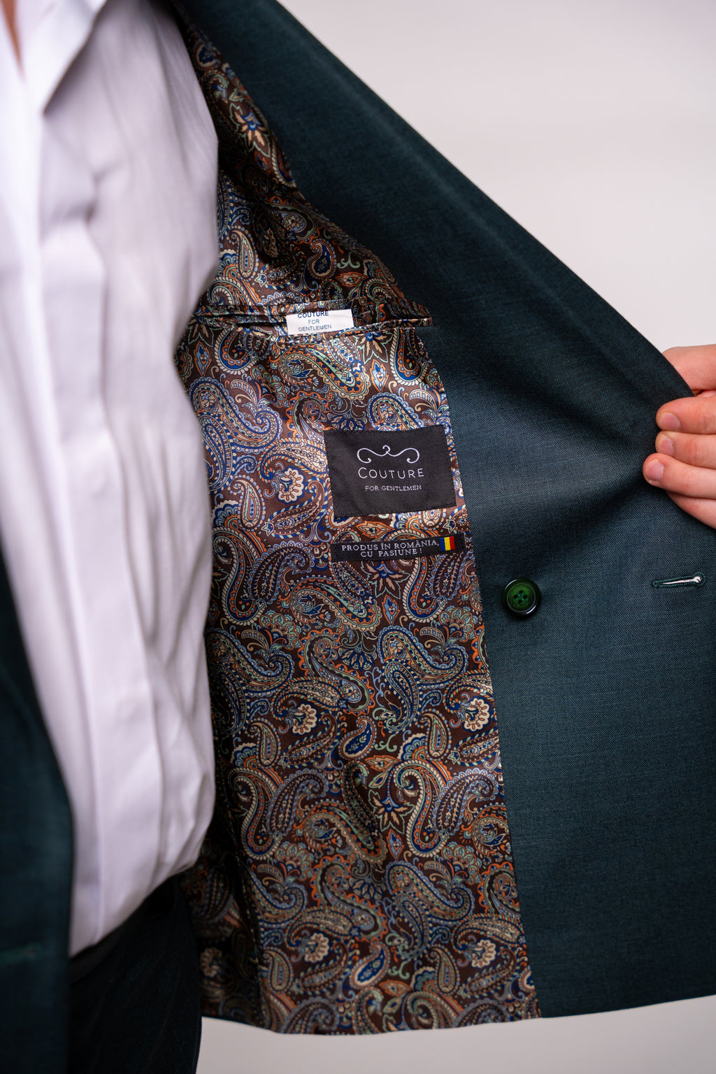Dark green men's blazer with two rows of buttons, stylish and tailored, from Couture for Gentlemen.