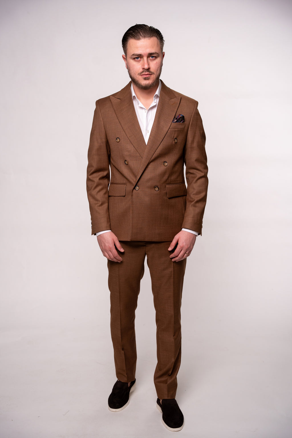 Men's brown double-breasted blazer with two rows of buttons, stylish and tailored by CoutureforGentlemen.