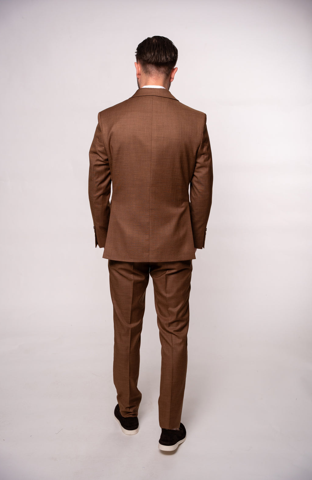 Men's brown double-breasted blazer with two rows of buttons, stylish and tailored by CoutureForGentlemen.