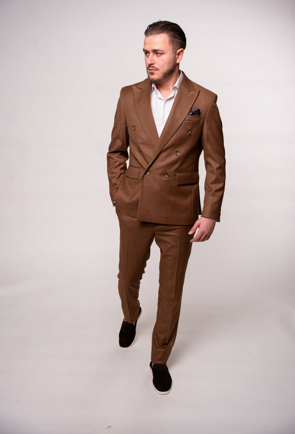 Men's brown double-breasted blazer with two rows of buttons, stylish and tailored by CoutureforGentlemen.