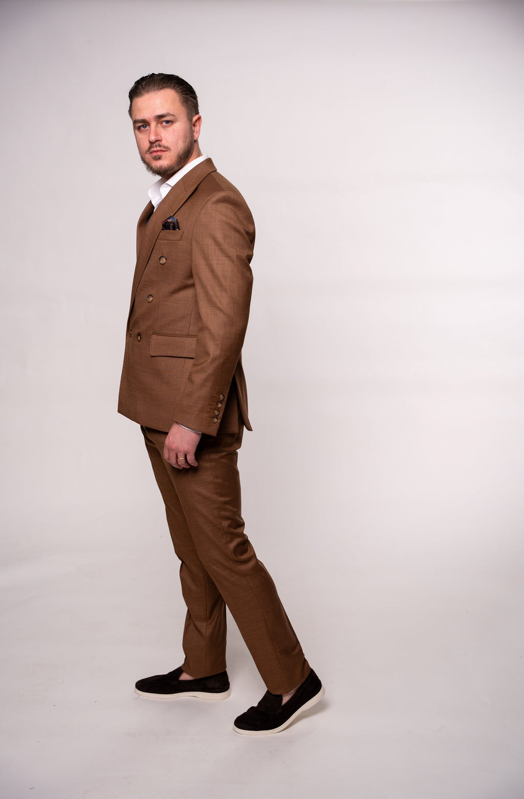 Men's brown double-breasted blazer with two rows of buttons, stylish and tailored by CoutureforGentlemen.
