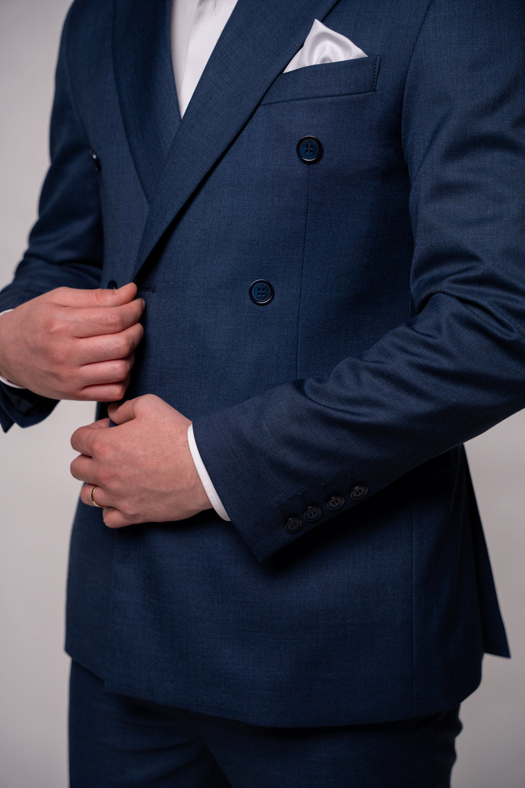Men's navy textured two-row button costume jacket, tailored fit, detailed fabric, stylish formal wear by CoutureforGentlemen.