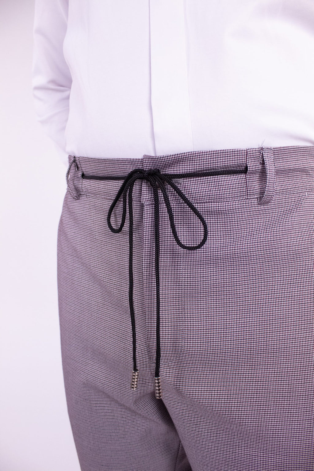 Dark blue textured chino pants by Couture for Gentlemen, slim fit, featuring classic style and modern tailoring.