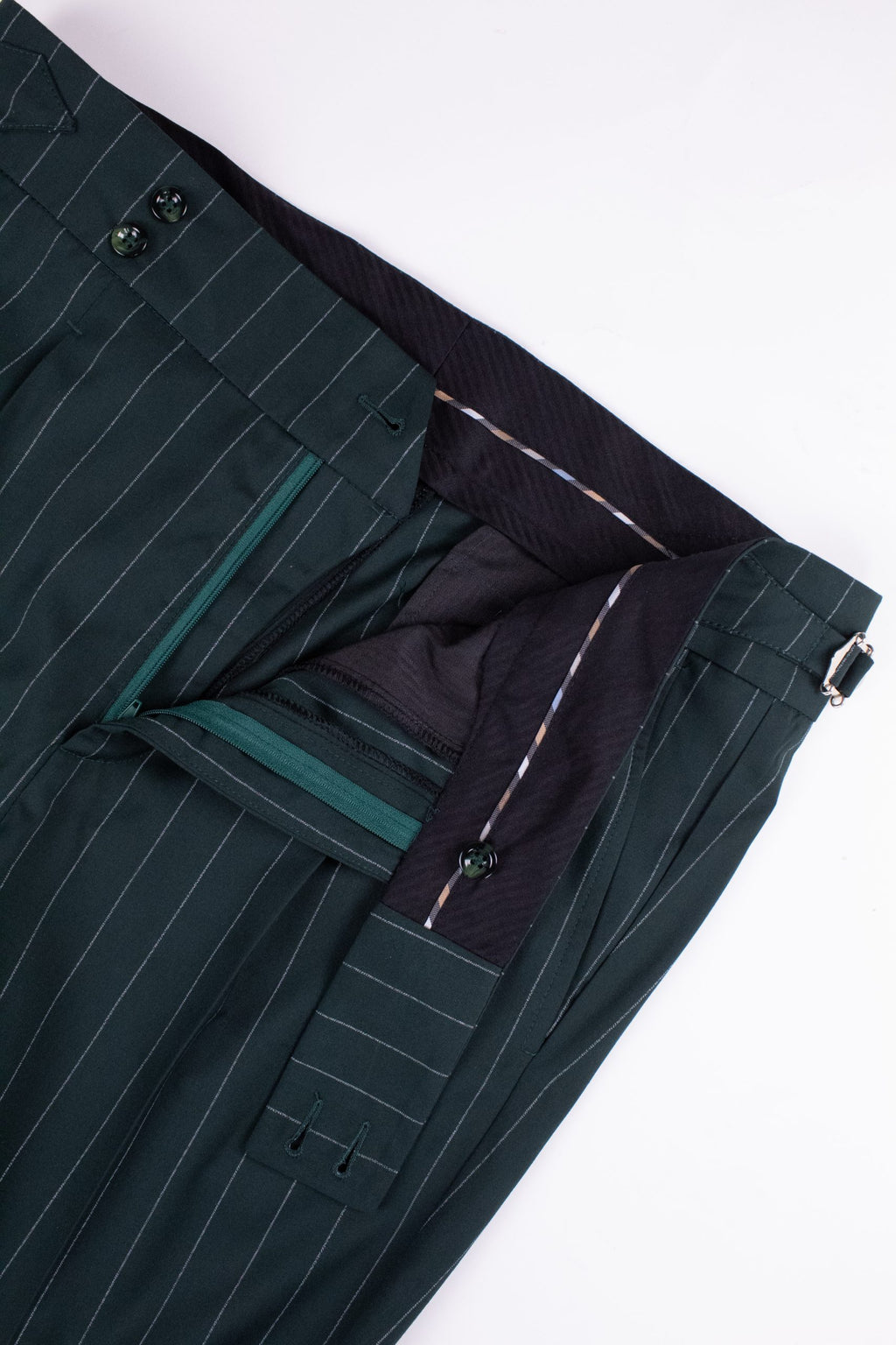 Italian-style green striped pants by Couture for Gentlemen, showcasing tailored fit and classic pattern.