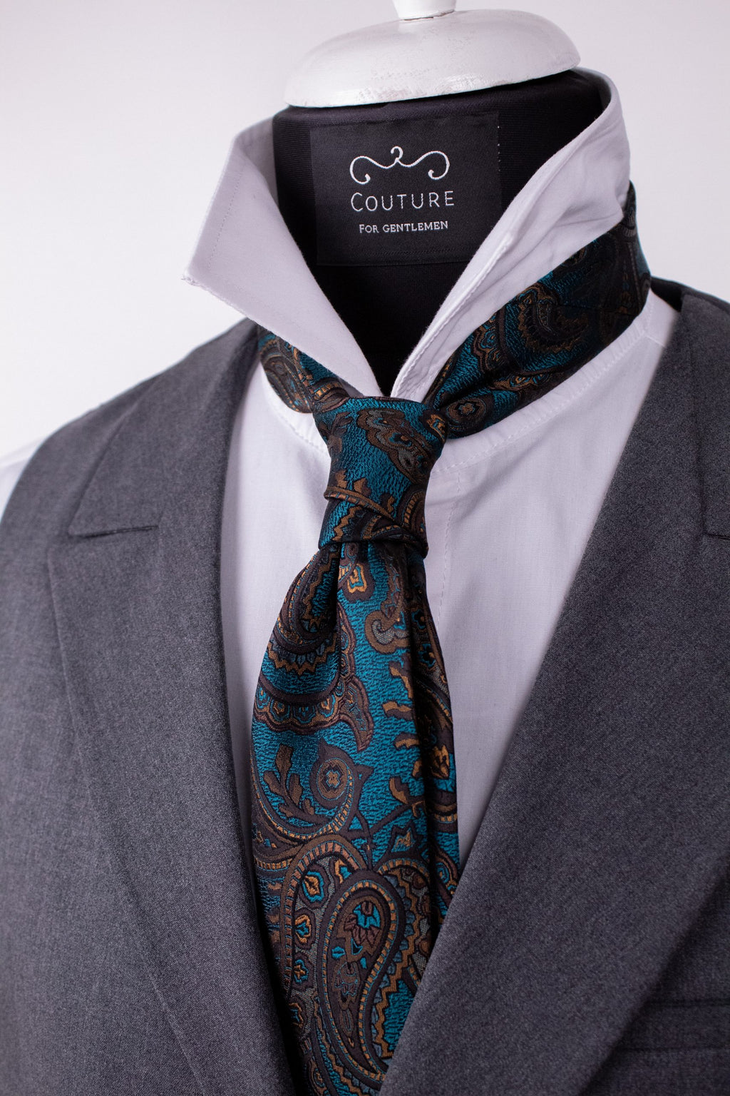 Maroon and turquoise silk cravat featuring elegant floral pattern, perfect for formal menswear by Couture for Gentlemen.