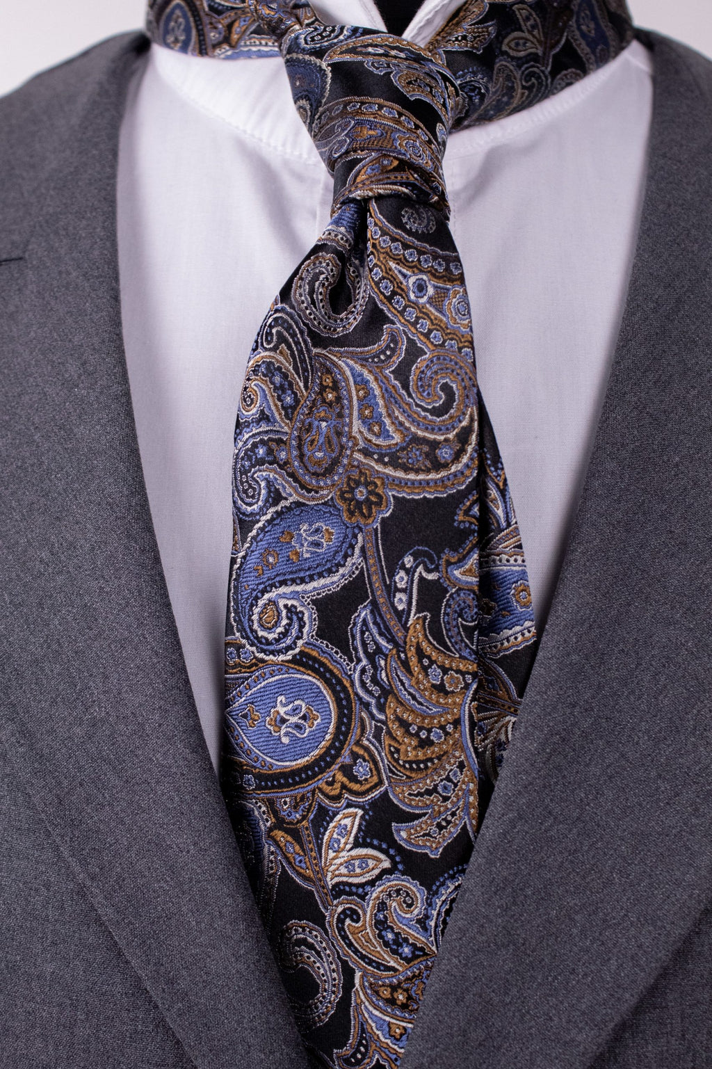 Black silk tie with colorful pattern, men's fashion accessory, stylish cravat for formal or business wear.
