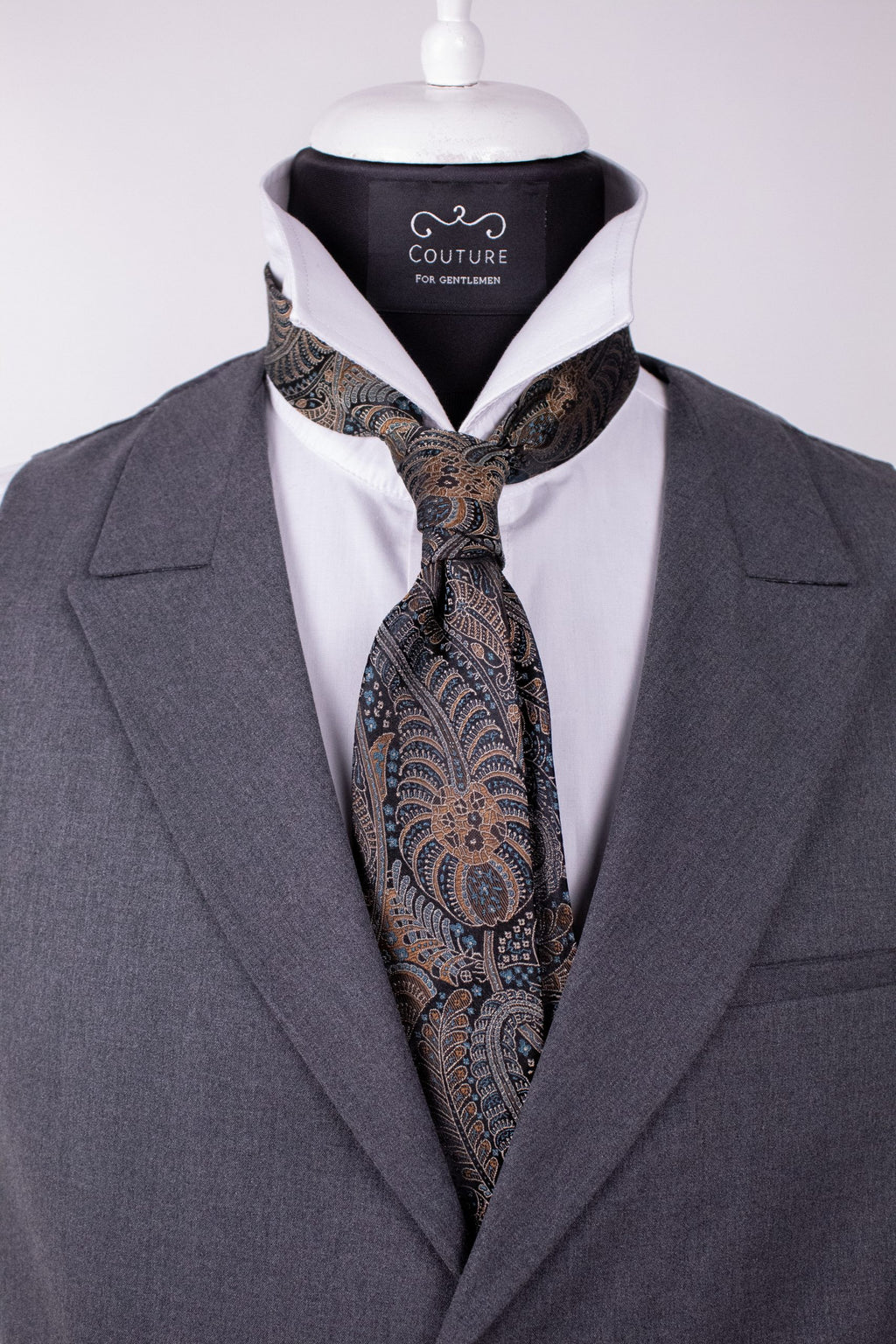 Natural silk floral motif cravat with elegant design, perfect for formal occasions, by Couture for Gentlemen.